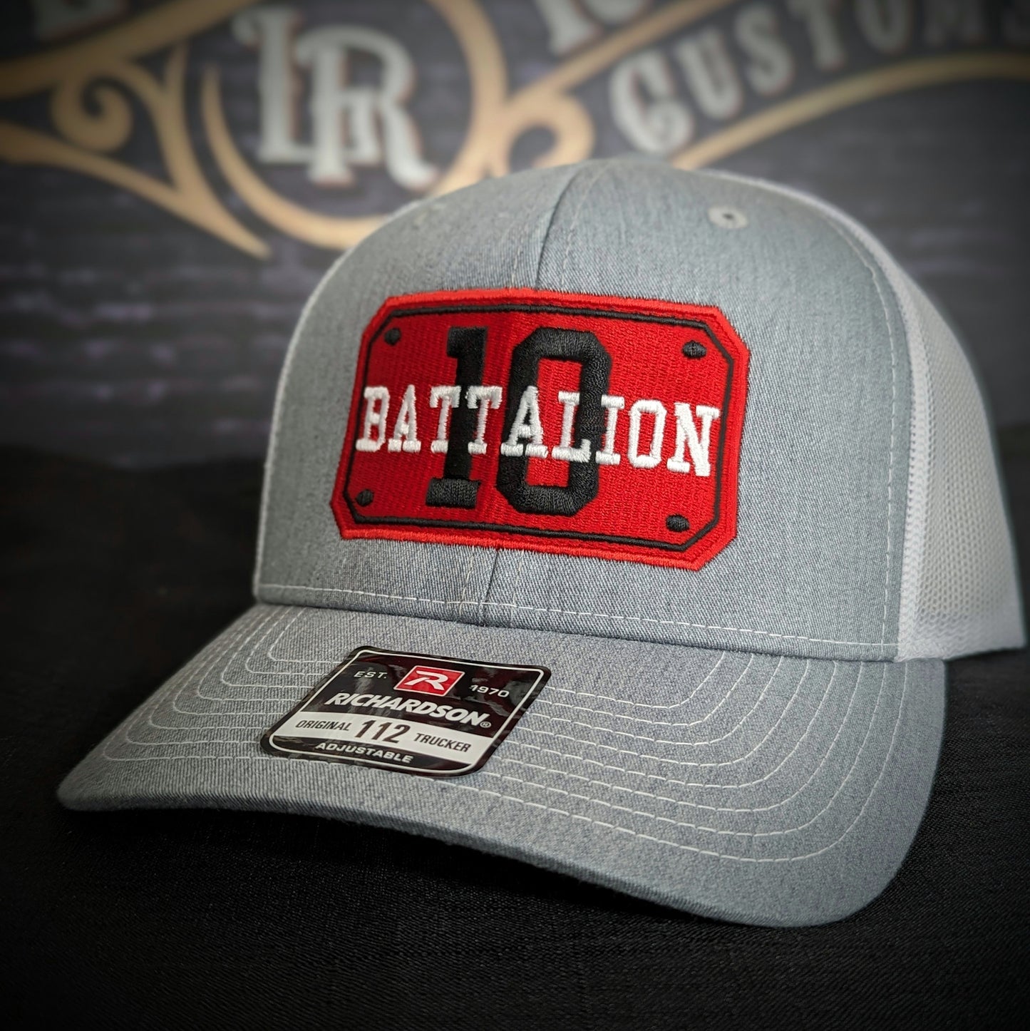 Custom embroidered firefighter hat with bold stitching, structured fit, and premium Richardson snapback design