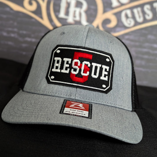 Custom embroidered firefighter hat with bold stitching, structured fit, and premium Richardson snapback design
