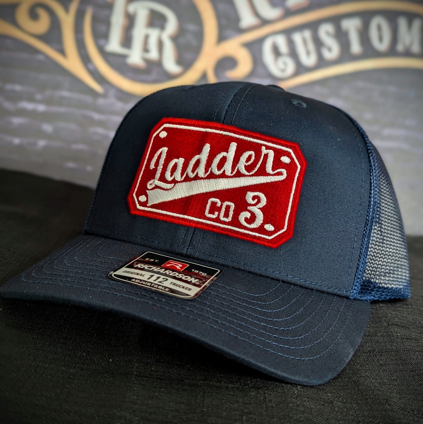 Custom embroidered firefighter hat with bold stitching, structured fit, and premium Richardson snapback design