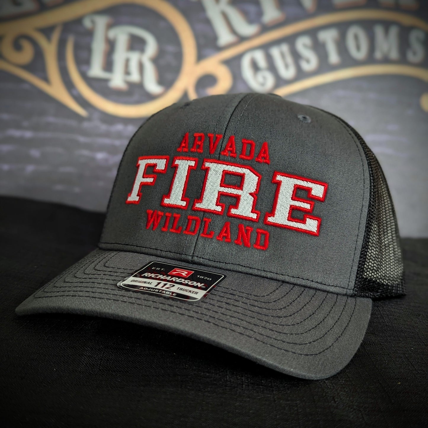 Custom embroidered firefighter hat with bold stitching, structured fit, and premium Richardson snapback design