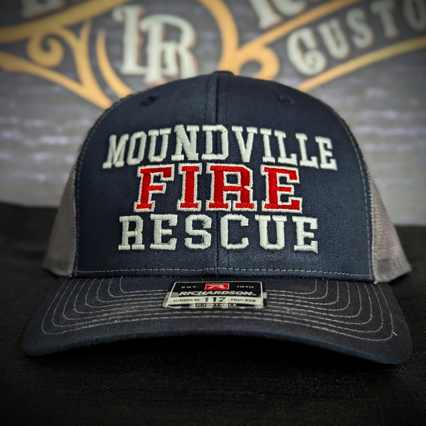 Custom embroidered firefighter hat with bold stitching, structured fit, and premium Richardson snapback design