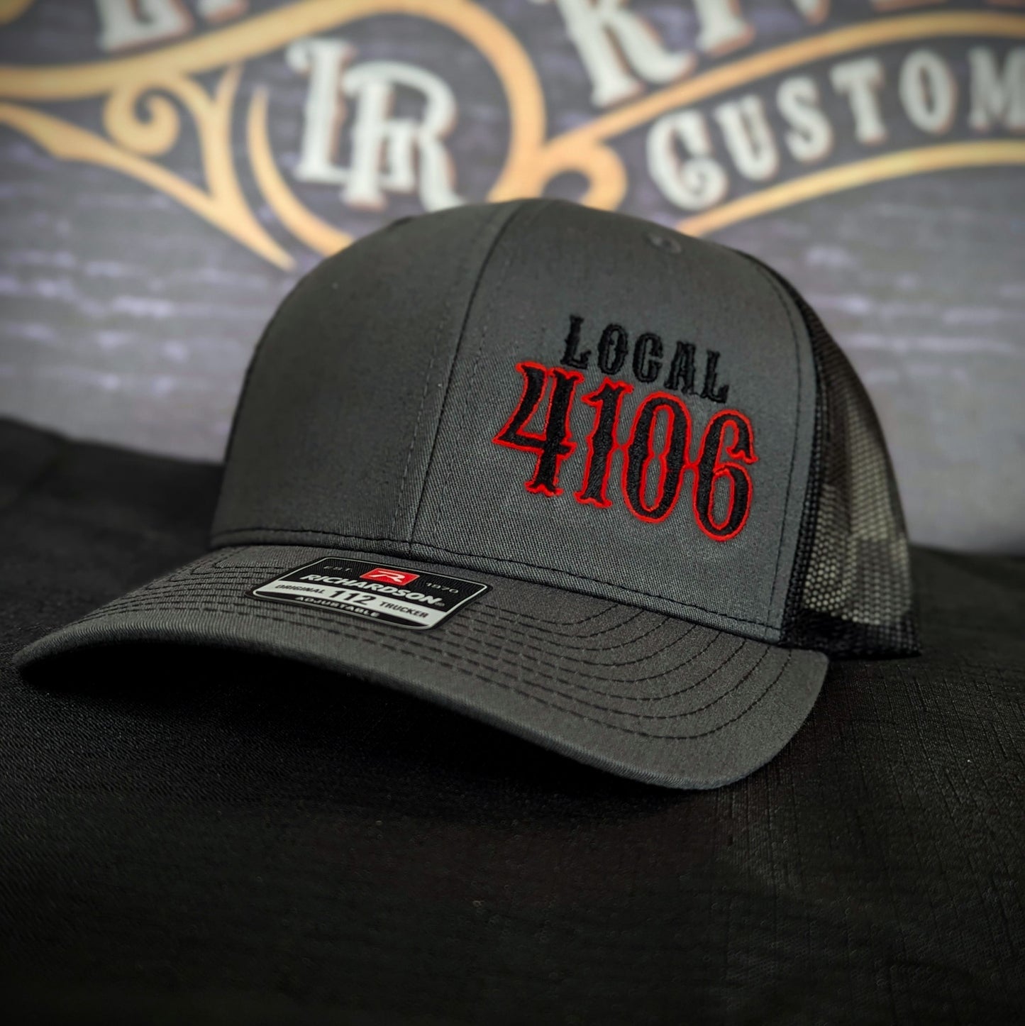 Custom embroidered firefighter hat with bold stitching, structured fit, and premium Richardson snapback design