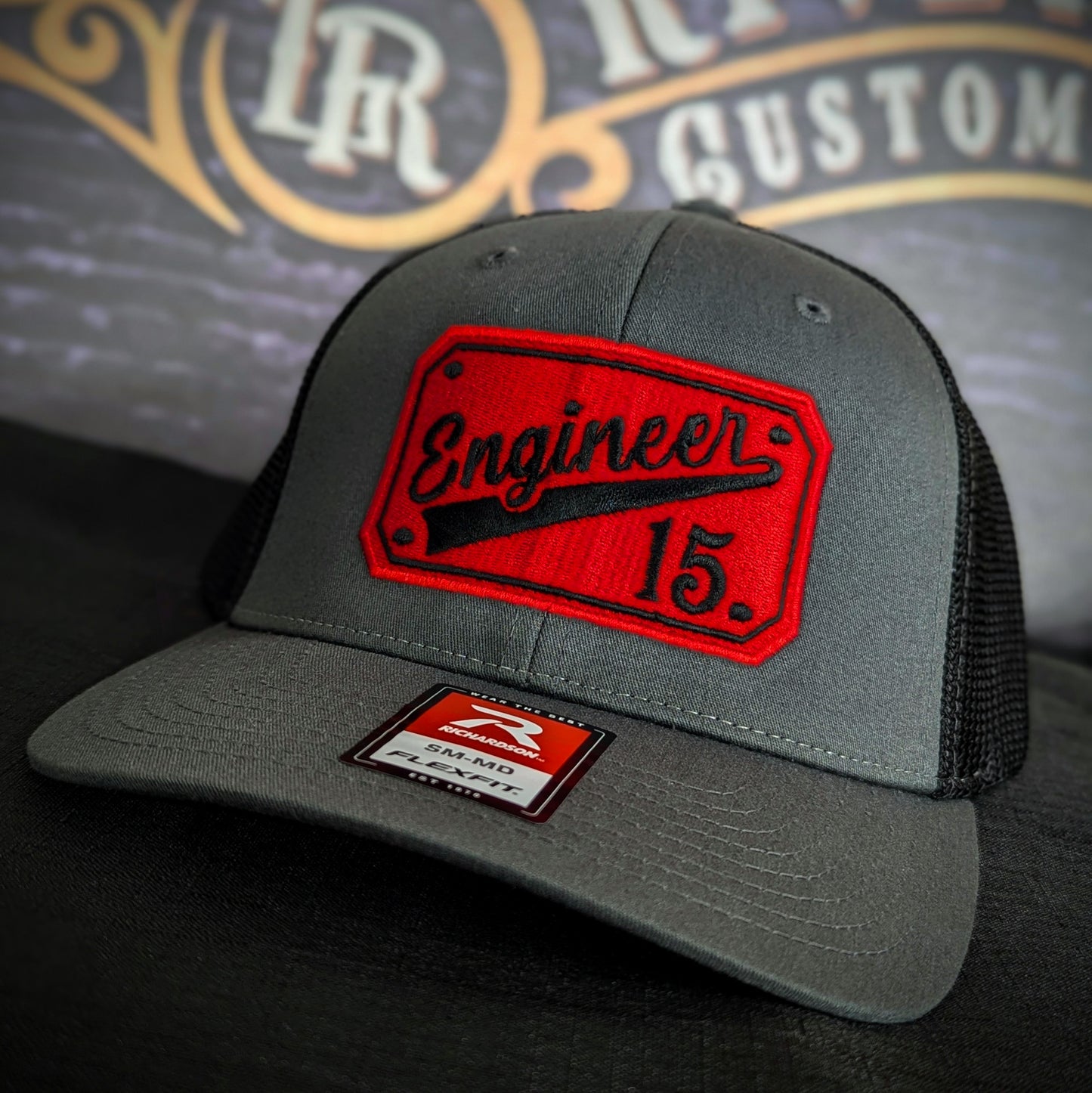 Custom embroidered firefighter hat with bold stitching, structured fit, and premium Richardson snapback design