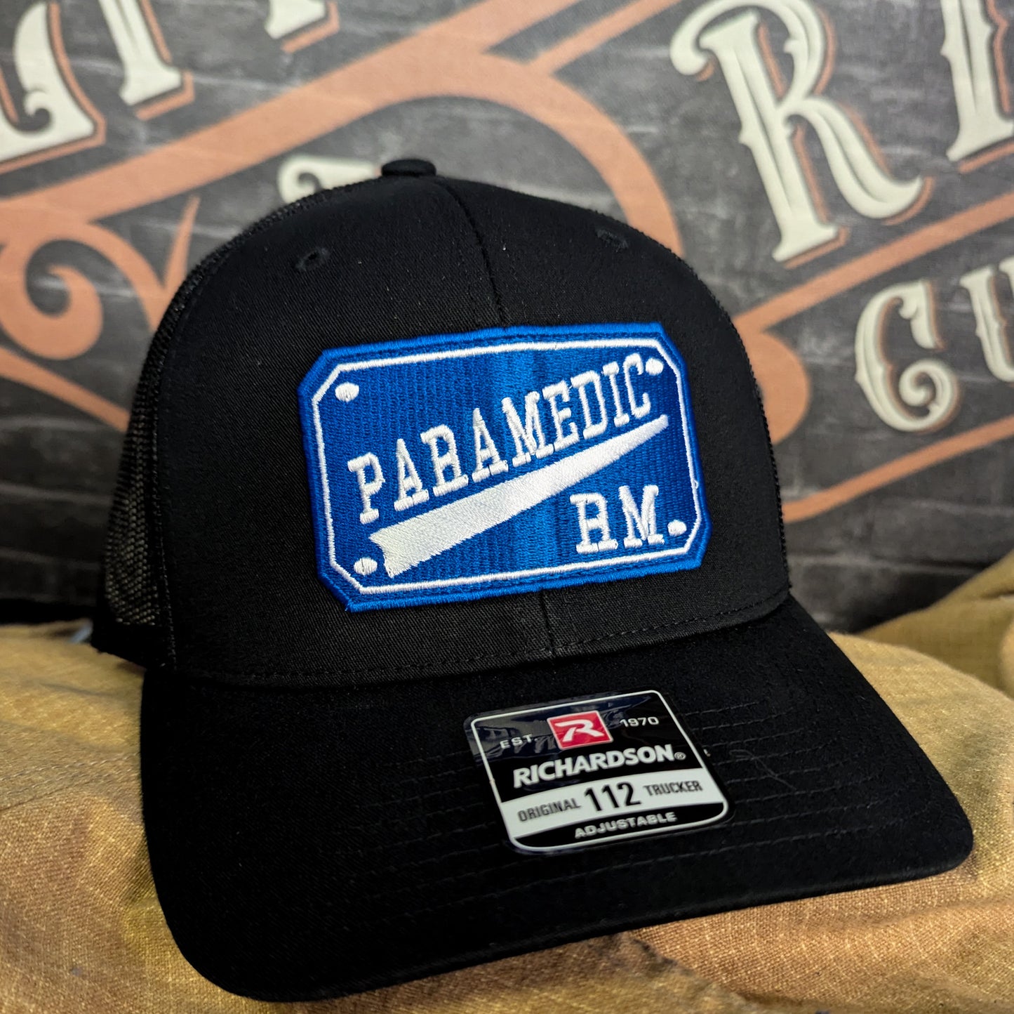 Custom embroidered firefighter hat with bold stitching, structured fit, and premium Richardson snapback design