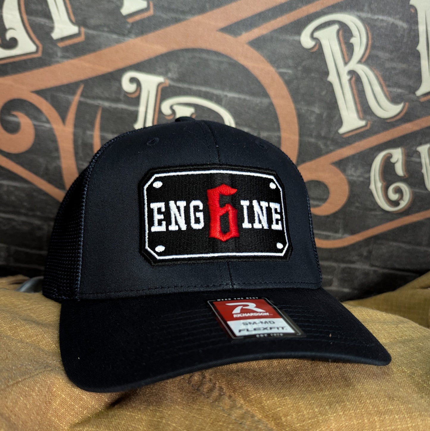 Custom embroidered firefighter hat with bold stitching, structured fit, and premium Richardson snapback design