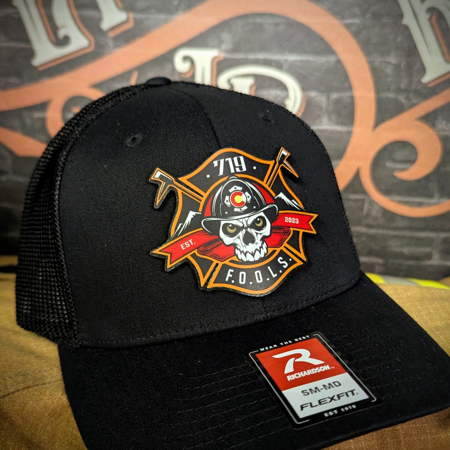 719 FOOLS firefighter hat with custom leather patch – Richardson Flexfit design featuring Colorado skull logo and axes