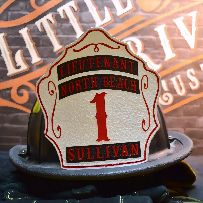 Hand-tooled leather firefighter helmet shield styled in rugged three rocker format