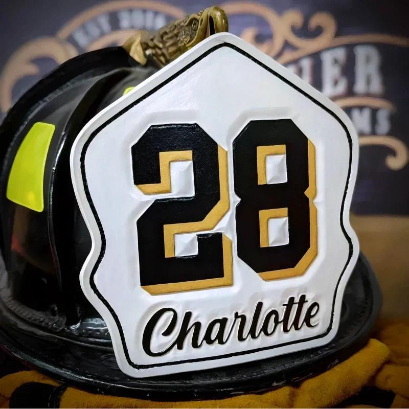 Leather firefighter helmet shield with detailed black gold and red design