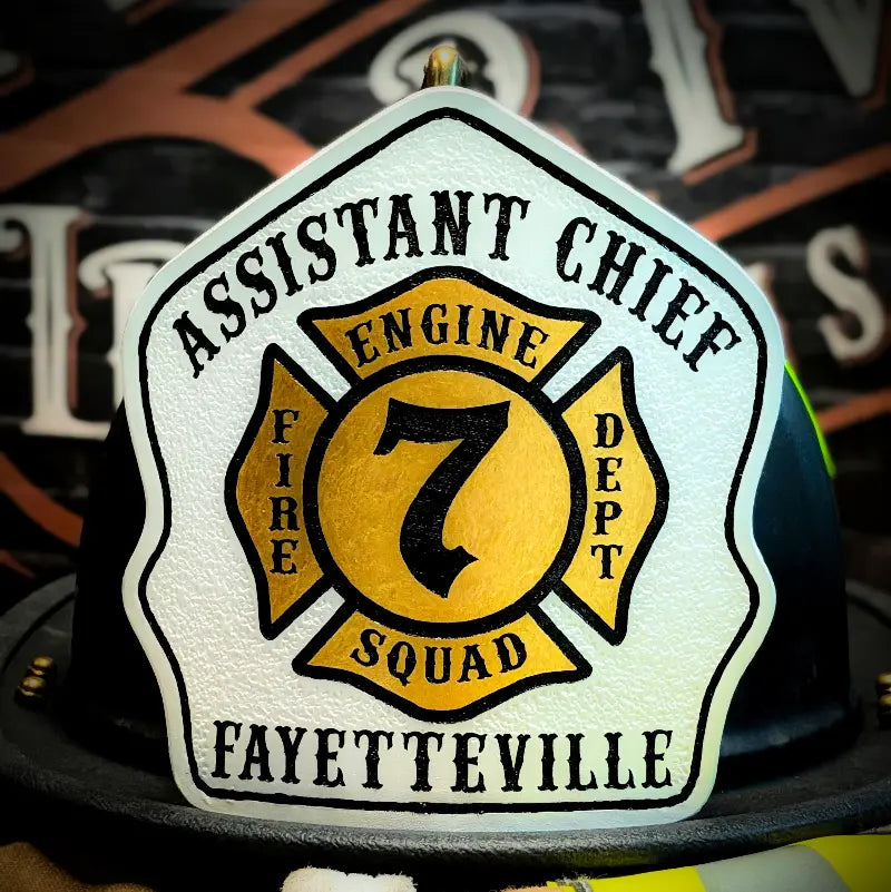 Custom firefighter helmet shield with classic Maltese cross design