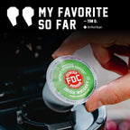 Hand placing a Irish Whiskey Infused Coffee Pods single pod into a coffee maker beside a customer quote