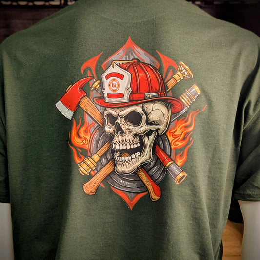 Back of firefighter shirt – skull with red fire helmet, axes, and hose, custom flame design from Little River Customs