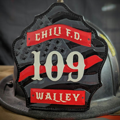 Custom firefighter helmet shield with American flag design, personalized leather front with unit number and firefighter name. Handcrafted fire helmet shield for professional firefighters, made for durability and pride on the job.
