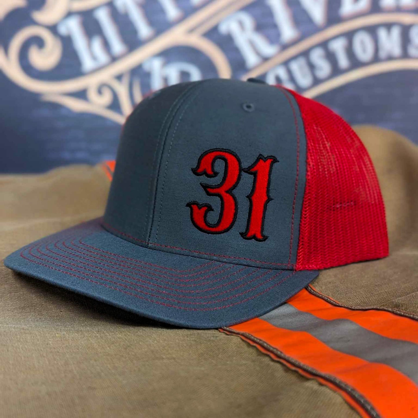 Custom embroidered firefighter hat with bold stitching, structured fit, and premium Richardson snapback design