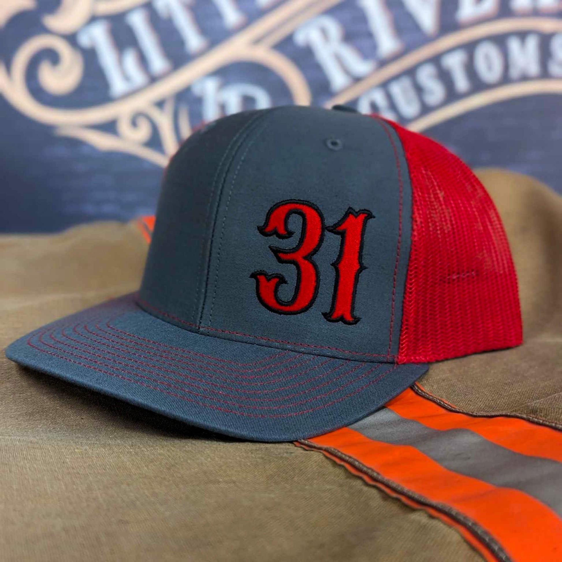 Custom embroidered firefighter hat with bold stitching, structured fit, and premium Richardson snapback design