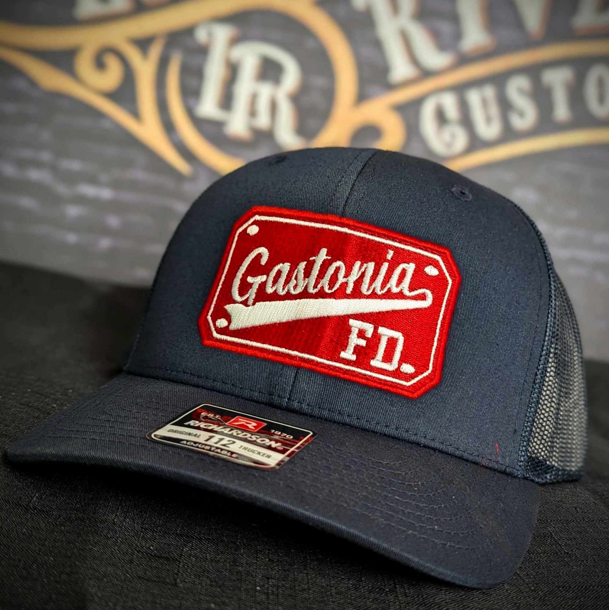 Custom embroidered firefighter hat with bold stitching, structured fit, and premium Richardson snapback design