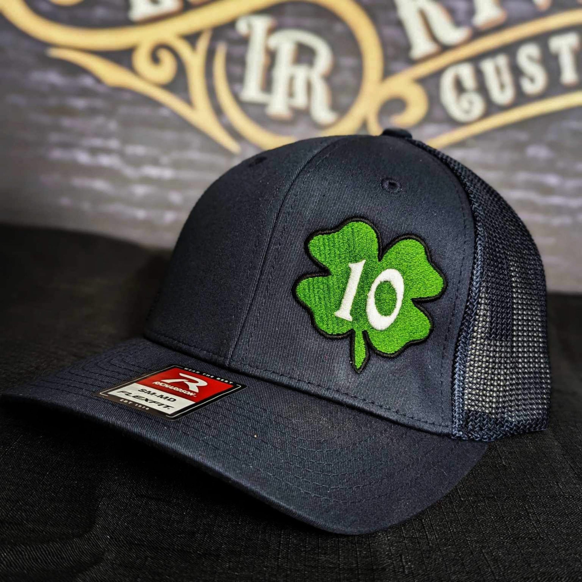 Custom embroidered firefighter hat with bold stitching, structured fit, and premium Richardson snapback design