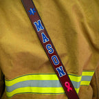 Personalized leather firefighter radio strap with adjustable fit and rugged construction