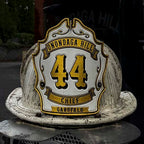 White and gold Smoke Eater chief helmet shield