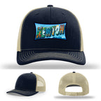 Richardson hat with leather patch featuring Newton NC mural artwork from downtown.