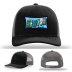Richardson hat with leather patch featuring Newton NC mural artwork from downtown.