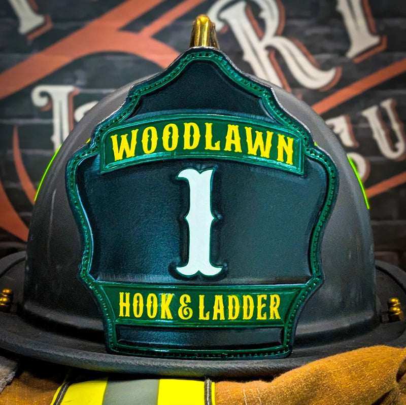 Custom leather helmet front with bold colors and hand tooling