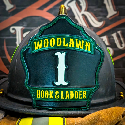 Custom leather helmet front with bold colors and hand tooling