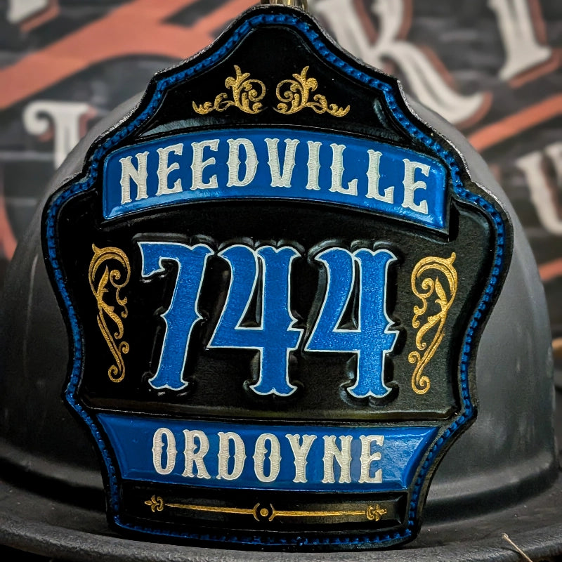 Custom leather fire helmet shield built for duty use