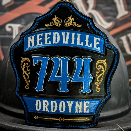 Custom leather fire helmet shield built for duty use