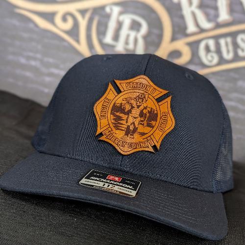 Custom leather patch for Murray County Fire Department. On a Richardson 112 navy hat