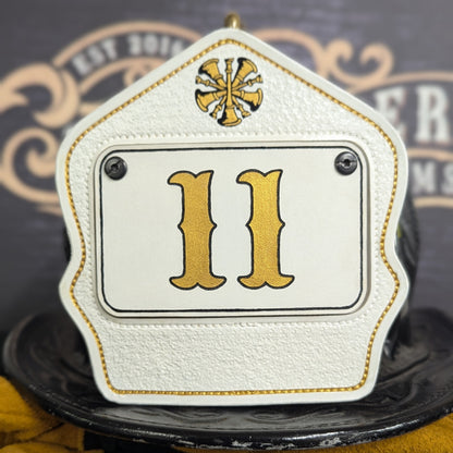 Personalized firefighter helmet shield in passport style with bold number, custom name, and clean line layout for rank, station, or company"
