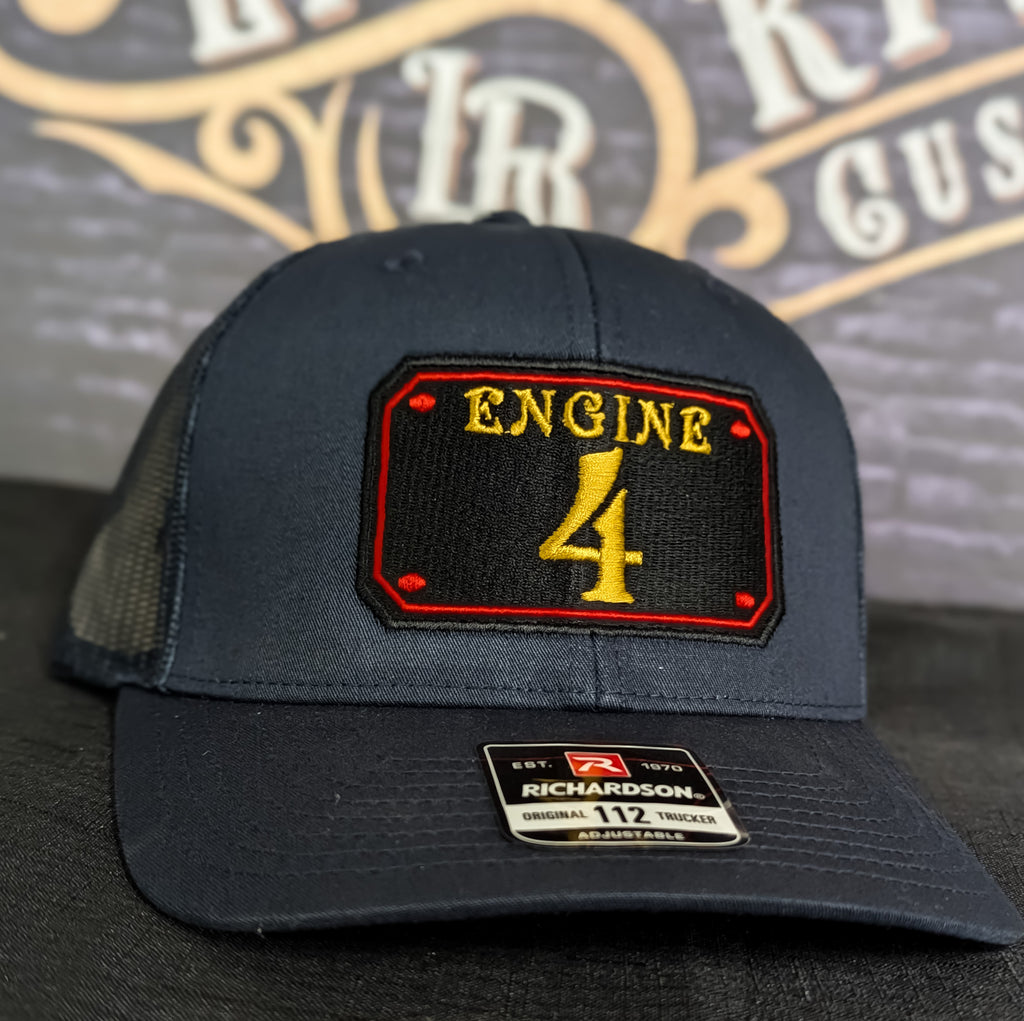 Custom embroidered firefighter hat with bold stitching, structured fit, and premium Richardson snapback design