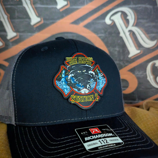 Custom firefighter hats with department logos, station numbers, or rank, featuring leather patches or embroidery on Richardson caps for fire department crews.