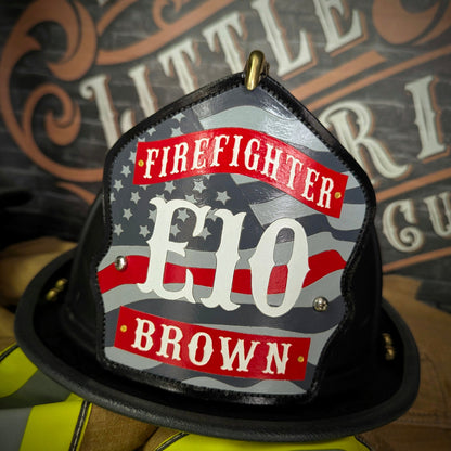 Custom firefighter helmet shield with American flag design, personalized leather front with unit number and firefighter name. Handcrafted fire helmet shield for professional firefighters, made for durability and pride on the job.