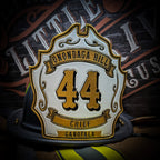 Hand painted custom leather firefighter helmet shield. 