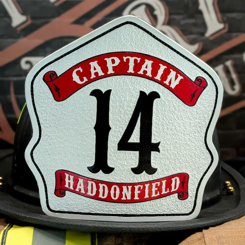 Custom firefighter helmet shield with leather and company numbers