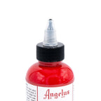 Angelus Easy Pour Twist Top Cap fitted to a red paint bottle