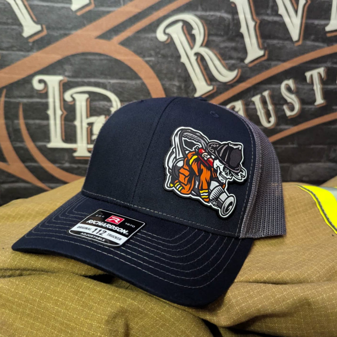 Firefighter lifestyle Richardson hat with fireman patch – featuring bold firefighter mascot artwork.