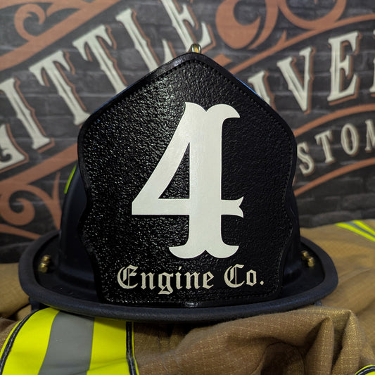 Black leather firefighter helmet shield with large white numeral “4” and “Engine Co.” lettering—mounted on a helmet.
