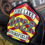 Custom Chevron firefighter helmet shield leather front built for the fireground