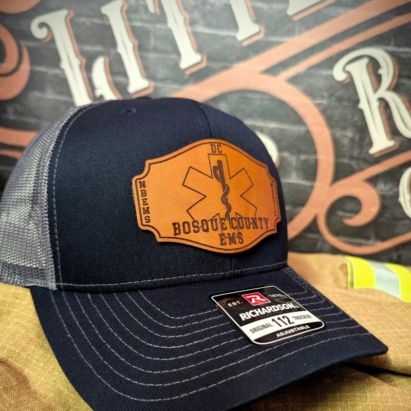 Personalized leather patch hat with station name