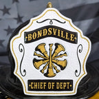 Firefighter helmet front with officer bugles carved in leather