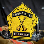 Leather firefighter officer helmet front with bugles and rank details