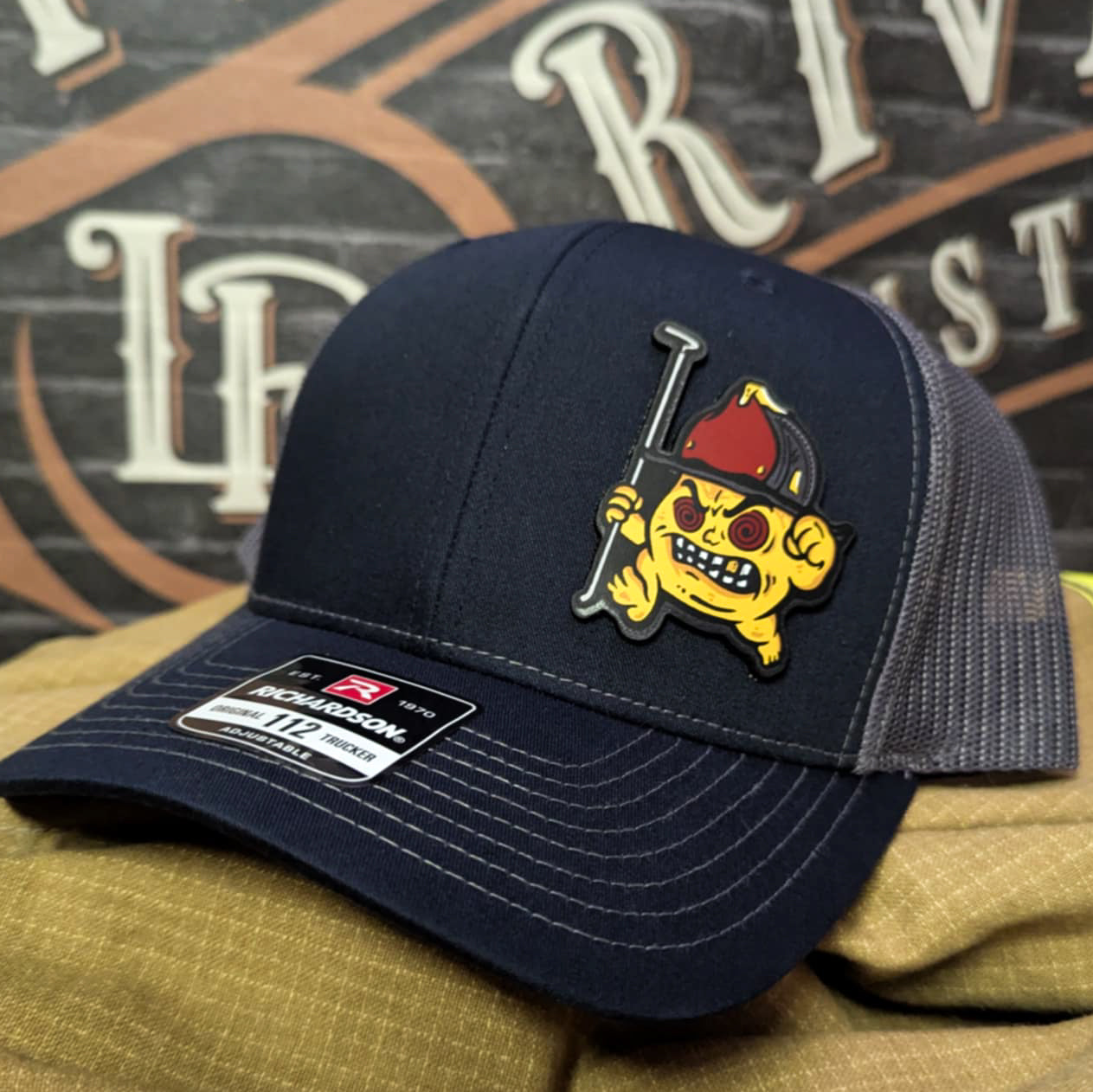 Custom firefighter hat with full-color leather patch design on Richardson hat
