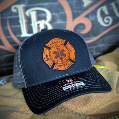 Custom firefighter hat featuring the Maltese Cross