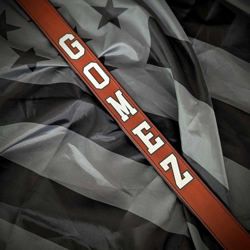 Firefighter radio strap shown with adjustable length measurement