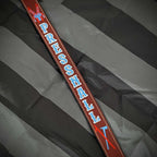 Custom leather firefighter radio strap with bright blue text