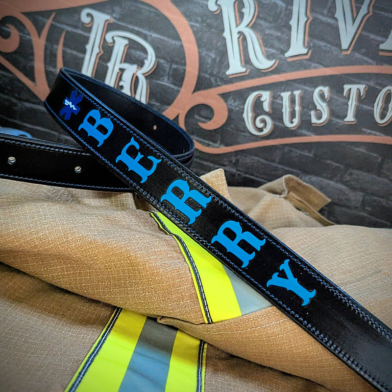 Leather firefighter radio strap showing text and color options