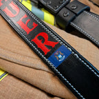 Firefighter radio strap on display showing full length view