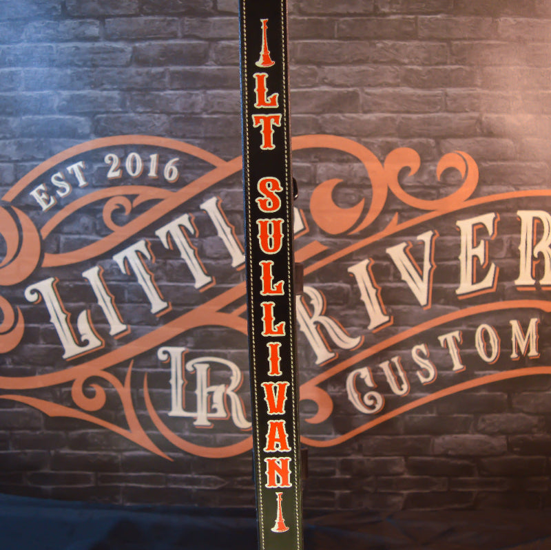 Leather firefighter radio strap with department logo artwork