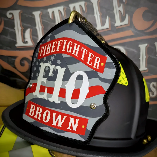 Custom Flag Firefighter Helmet Shield with E10 number, American flag background, and Brown nameplate on a black fire helmet.